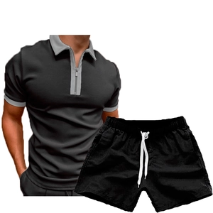 Men's dark grey quarter-zip polo shirt and black drawstring shorts matching outfit set