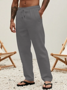 Men's breathable grey linen pants with elastic drawstring waist for summer outdoor leisure