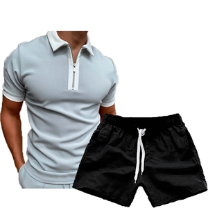 Men's casual set featuring a light blue short sleeve zip polo shirt with black sports shorts