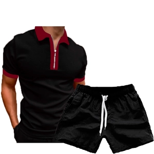 Men's casual black two-piece polo set with zipper collar and matching drawstring shorts
