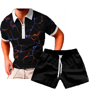 Detail of men's summer set with marble print polo shirt and black drawstring shorts