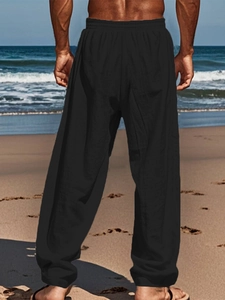 Men's hip-hop black cotton linen joggers featuring elastic waist and tapered ankle cuffs