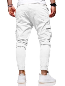 Detailed back view of white cargo joggers showing side flap pockets and ribbed cuffs