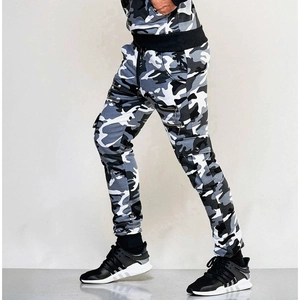 Detail view of men's camouflage joggers featuring side cargo pockets and metal zippers