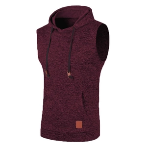 Close-up of burgundy knit hoodie vest featuring kangaroo pocket and leather patch detail