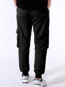Rear view of men's black cargo joggers with large side pockets and elastic ankle cuffs