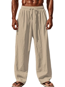 Detailed texture of men's breathable cotton linen blend trousers with drawstring waist