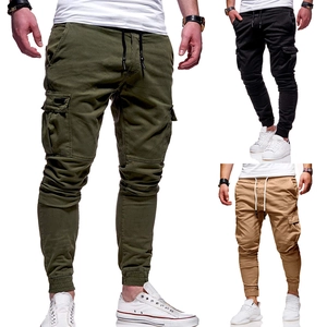 Detail view of cargo joggers featuring drawstring waist and large side flap pockets