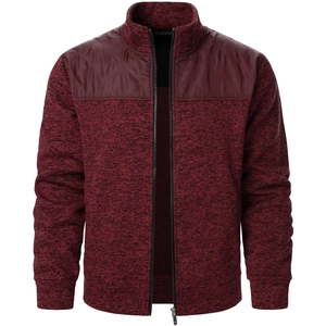 Detailed close-up of wine red knitted zip cardigan with quilted shoulder patches