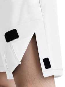 Close-up of the easy-open velcro side fastener on white medical nursing pants