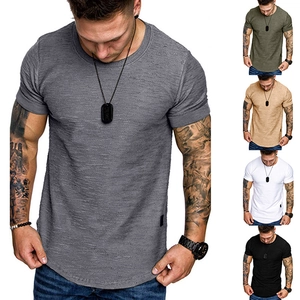 Close-up of the curved hem and slub texture fabric on men's casual crew neck t-shirts