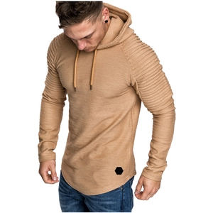Detail of men's slim fit khaki hoodie featuring pleated raglan sleeves and rib texture