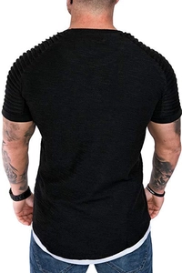 Detail of men's slim black T-shirt featuring pleated shoulder design and curved hemline