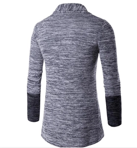 Detail of heather grey knit cardigan with contrast dark cuffs and ribbed texture fabric