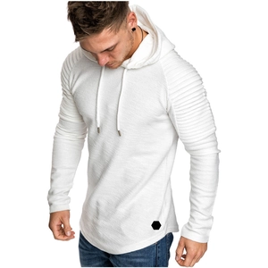 Detail of white men's hoodie featuring unique pleated raglan sleeves and a curved hemline