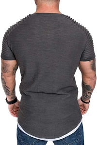 Detail of dark grey textured T-shirt showing textured fabric and 3D shoulder pleats