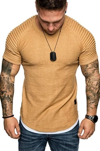 Detail of ginger yellow t-shirt featuring ribbed shoulder texture and layered hem design