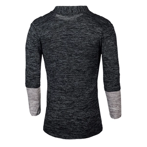 Detail view of men's knit sweater with mock neck and contrast light grey cuffs