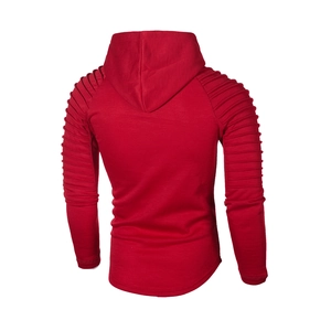 Detailed back view of red hoodie showing unique ribbed pleated design on sleeves