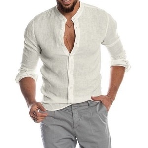 Detail of men's white linen shirt with mandarin collar and breathable fabric texture