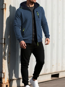 Detail of men's blue hoodie with neon green zipper accents and knit texture