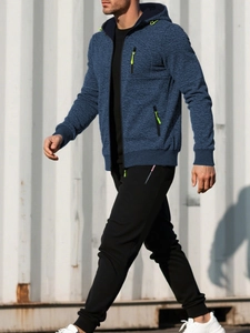 Detail of dark blue textured hooded jacket and black joggers set on a model