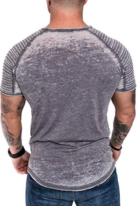 Macro detail of acid wash grey t-shirt with ribbed shoulder texture and curved hemline