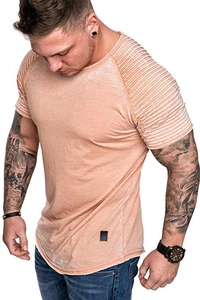 Detailed shot of men's acid wash T-shirt featuring curved hem and ribbed sleeve cuffs