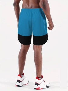 Detail of blue and black color-block running shorts with quick-dry breathable fabric