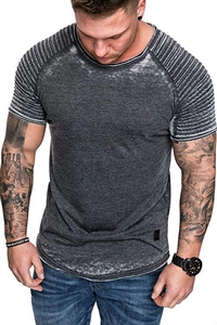 Close-up of shoulder ribbing and acid-washed texture on men's fitted grey T-shirt