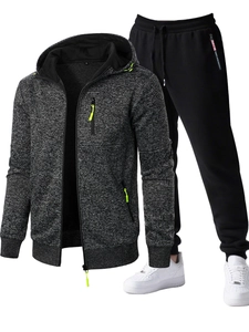 Detail of men's sports tracksuit with jacquard texture and neon green zipper puller detail