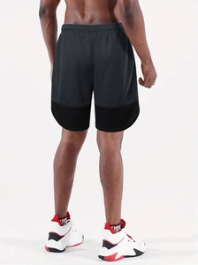 Detail view of men's marathon running shorts with breathable mesh and elastic waistband