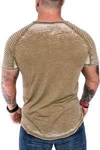 Detail view of olive green burnout fabric and ribbed shoulder texture on men's t-shirt