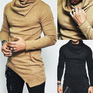 Detail of men's turtleneck knit top with asymmetrical hem and soft draped texture