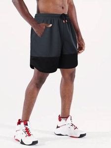 Detail view of quick-dry running shorts with breathable mesh and adjustable drawstring