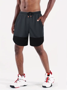 Detail of men's marathon shorts featuring breathable mesh splicing and elastic drawstring waist