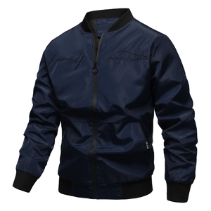 Detail of navy blue bomber jacket with embroidery and ribbed stand-up collar design