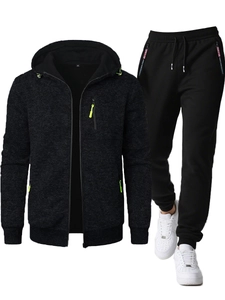 Men's black hooded sports tracksuit with neon green zipper details and jogger set