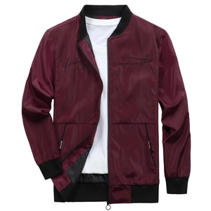 Stylish burgundy men's bomber jacket with black embroidery and ribbed collar detail