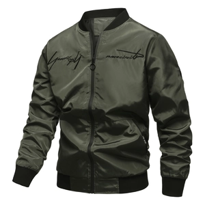 Detail of olive green bomber jacket featuring black cursive embroidery and ribbed collar