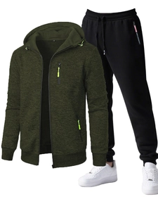 Detail of dark green hooded cardigan with neon zipper and black sports joggers