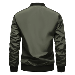 Rear view of green bomber jacket with satin finish and black ribbed collar and cuffs