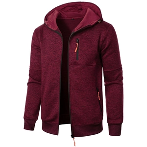 Detail of burgundy zip-up hoodie featuring melange texture and orange zipper pocket