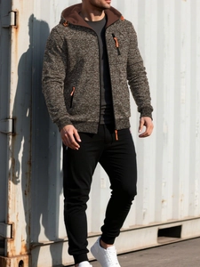 Detail of men's hooded jacket with dark brown texture and orange zipper pockets