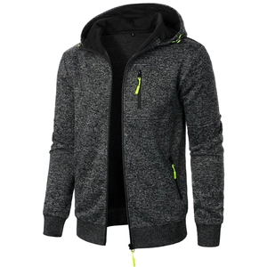 Detail of men's knit hoodie with neon green zipper puller and drawstring accents