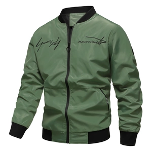 Detail of army green bomber jacket with black ribbed collar and artistic embroidery