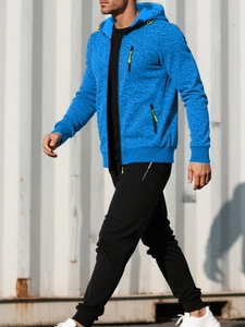 Close-up of blue hooded knit jacket showing waffle texture and yellow zipper detail