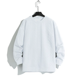 Men's oversized white waffle knit sweater with textured crew neck and ribbed cuffs