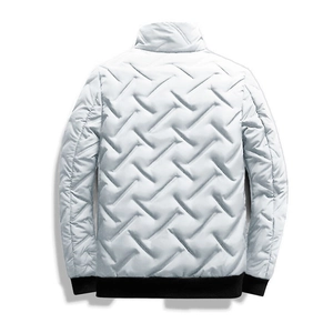 Macro detail of men white padded jacket showing quilted wave texture and black ribbed collar