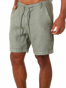 Detail view of men's sage green linen shorts featuring elastic waist and cotton drawstring